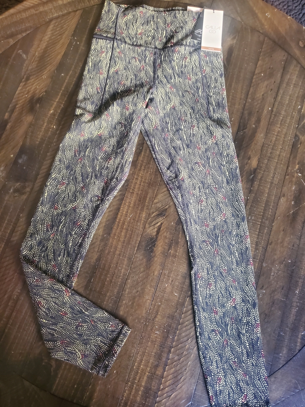 CALIA by Carrie Underwood Black Patterned Leggings with Red & Cream Accents